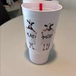 Chick-fil-a travel cup with lid and red straw, tag included inside of cup!